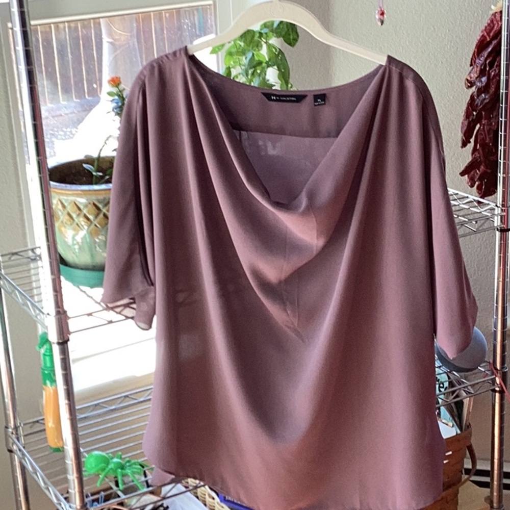 Purple short sleeve blouse.